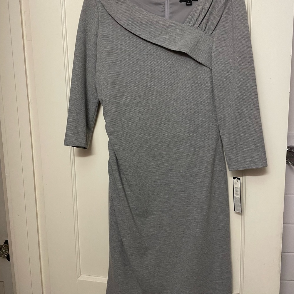 3/4 sleeve, knee length dress.